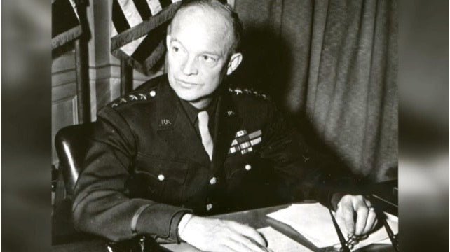President Eisenhower takes the shape of Ike, the military dog.